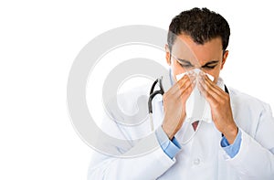 Sneezing sick male doctor