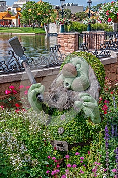 Sneezy character topairy displayed at Epcot