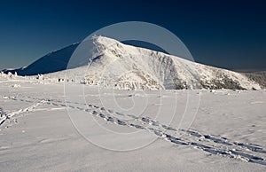 Snezka mountain in winter, Czech-Poland border photo