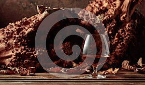 Sniffer of brandy on an old wooden table