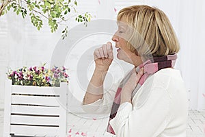 Snior woman having a flu