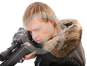 Sniper with rifle aims photo