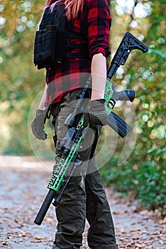 Sniper rifle in female hands.Selective focus