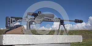 Sniper rifle with scope and silencer