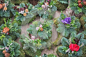 Snitch and wreaths from flowers, All Saints Day concept. photo