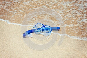 Snorkel mask on the beach