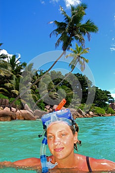 Snorkeler on tropical island