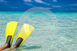 Snorkeling fins on a sandbank