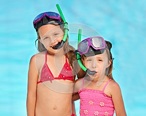 Snorkeling, goggles and portrait of kids at swimming pool, ready for adventure on vacation. Holiday, games or friends