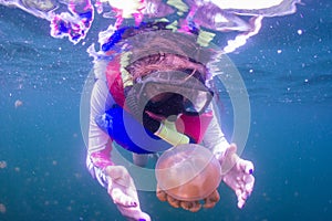 Snorkeling in Jellyfish lake with life jacket