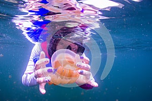 Snorkeling in Jellyfish lake with life jacket