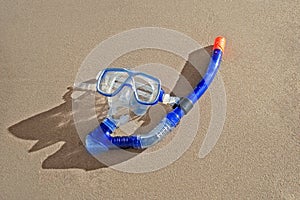 Snorkeling mask on a beach