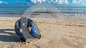 Snorkeling mask ready for diving adventures on a Caribbean beach