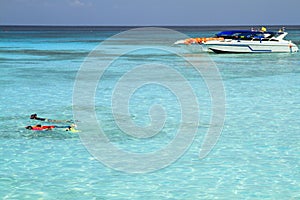 Snorkeling in seawater emerald color