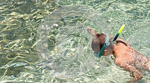 Snorkeling, swimming, summer activity on beach family vacation, water sports. Child enjoy nature, swim and dive in sea