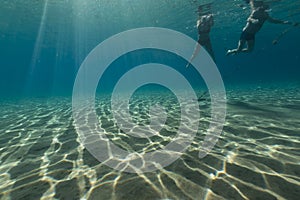 Snorklers and tropical waters of the Red Sea.