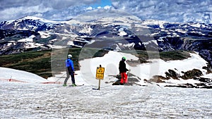 Snow activities in summer in Wyoming. Wonderful and only summer ski area. Yellowstone. Northwest alpine landscape. Road trip.