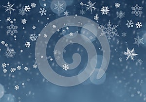 Snow background. Blue Christmas snowfall with defocused flakes and swirls. Winter concept with falling snow. Holiday texture and