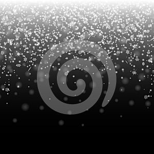 Snow on black background. Winter snowfall.