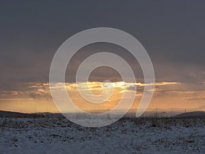 Snow blanket over the hills in a countryside in winter