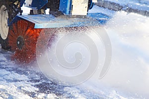 Snow blower running on a winter day