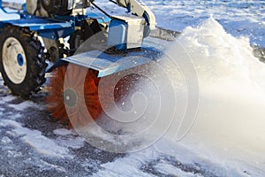 Snow blower running on a winter day