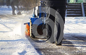 Snow blower running on a winter day