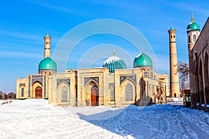 Snow, blue domes and ornated mosques and minarets of Hazrati