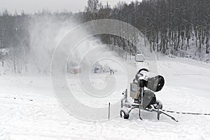 Snow cannon on the ski slope