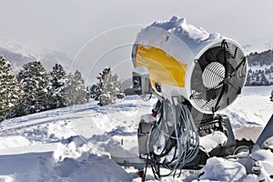 Snow cannon on the snow in the mountain