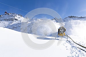 Snow cannon, snowmaker in action at ski resort