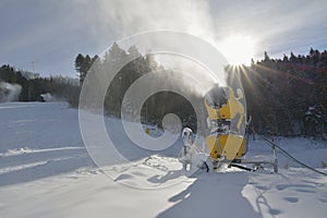 Snow cannon in winter mountain