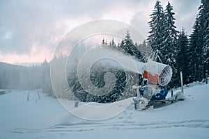 Snow cannon in winter mountains