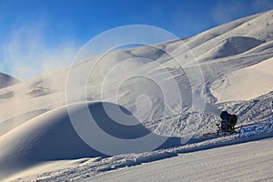 Snow cannon at work at Livigno ski resort, Italy