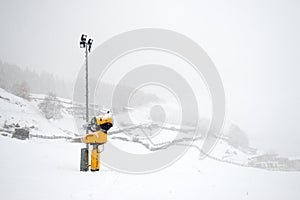 A snow cannon working near the ski slope