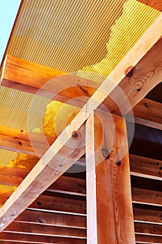 snow on canopy made of transparent sheets of polycarbonate