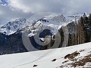 Snow-capped alpine peak LÃ¼tispitz Luetispitz or Lutispitz, 1986 m and Schofwisspitz 1989 m in Alpstein mountain range