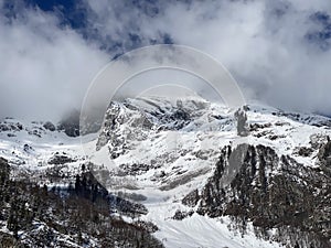 Snow-capped alpine peak Stoss or Stooss, 2112 m in Alpstein mountain range and in Appenzell Alps massif, Unterwasser
