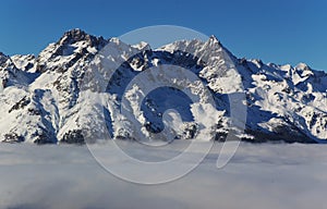 Snow capped Alpine peaks