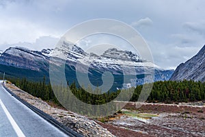 Snow-capped Cirrus Mountain in late autumn season.