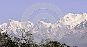 Snow capped Himalayan range, mount kumbhakarna and mount kabru from lepcha jagat near darjeeling in west bengal, india