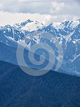 Snow capped mountain peaks