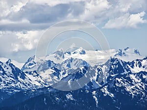 Snow capped mountain peaks