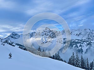 Snow capped mountain ridge with Zimba in the Austrian Alps. Montafon, Vorarlberg, Austria. photo
