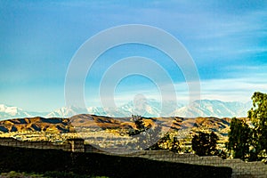 Snow capped mountains above the hills of Anaheim California photo