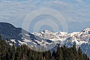Snow-capped mountains against blue sky