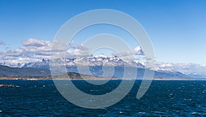 Snow capped mountains in Beagle Channel by Ushuaia