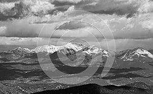 Snow Capped Mountains And Cloud Shadows