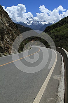 Snow-capped mountains and highway