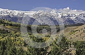 Snow capped mountains in the landscape of Yellowstone National Park.